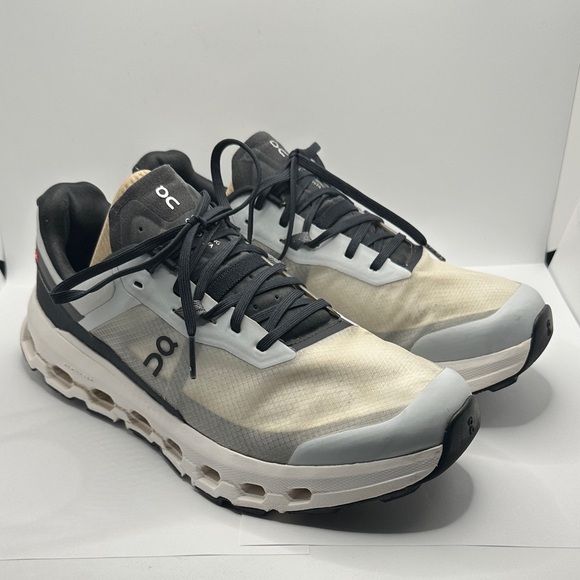 On Running Men\'s Cream and Black Athletic Shoes